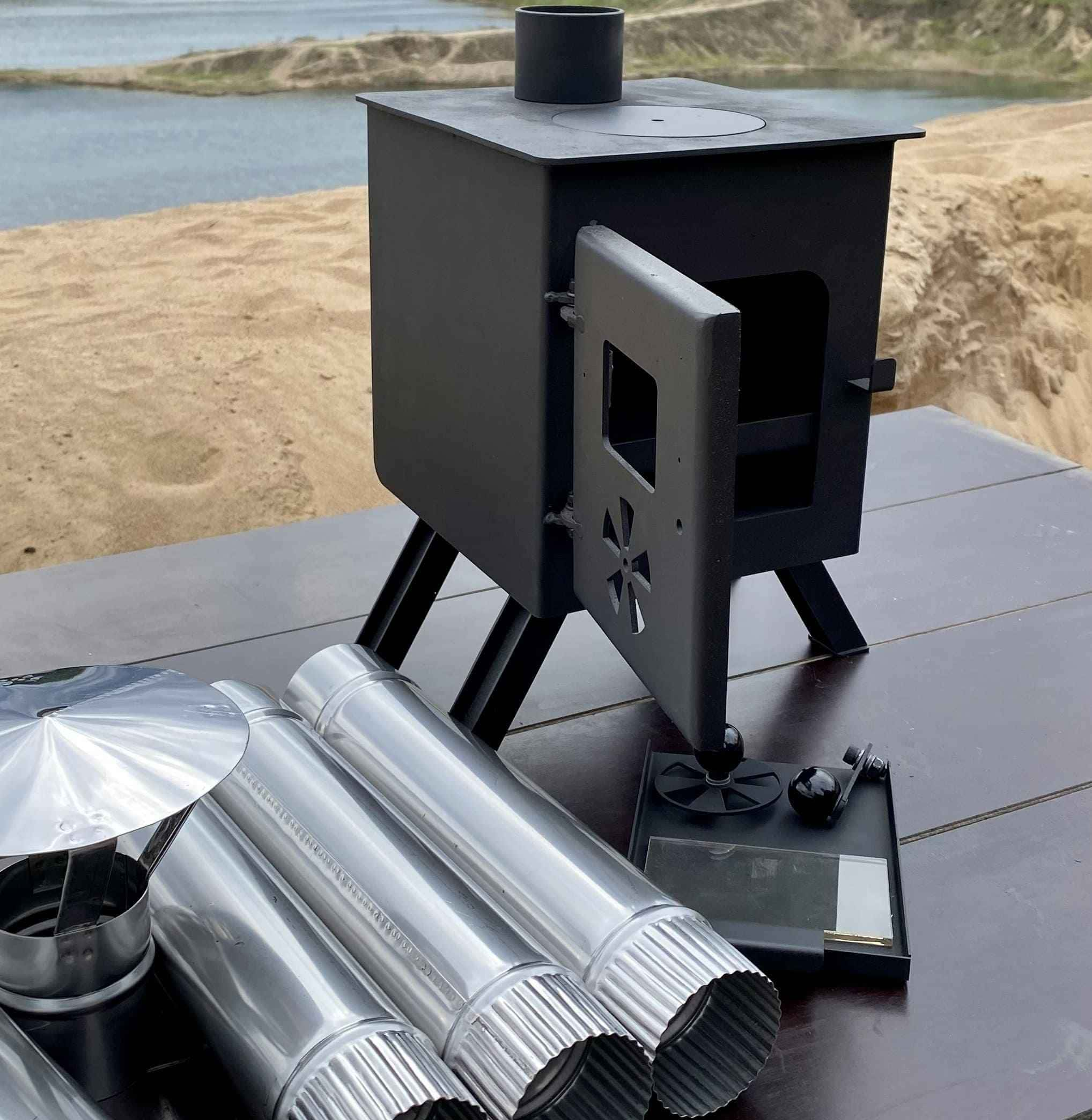 Wall tent pellet clearance stove